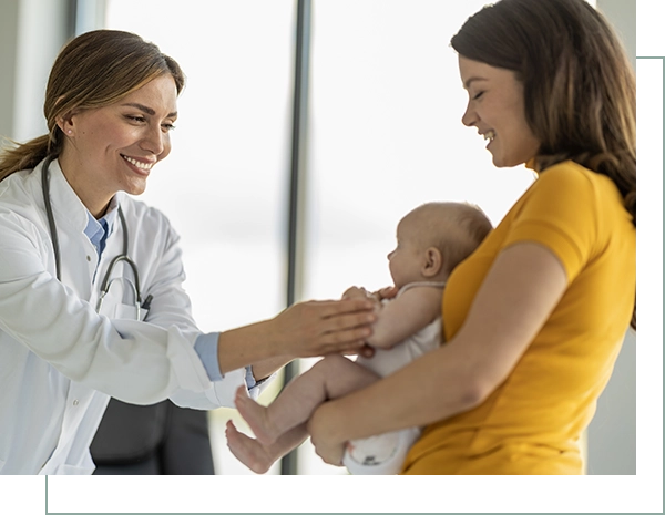 Doctor pediatrician and baby patient in clinic